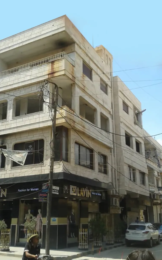 بناية موضوع دعوى قضائية بالقامشلي (الجزيرة)